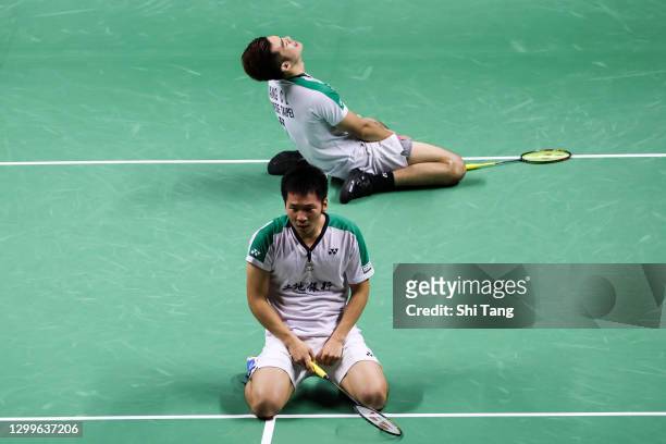 Lee Yang and Wang Chi-Lin of Chinese Taipei celebrate the victory in the Men’s Double final match against Mohammad Ahsan and Hendra Setiawan of...