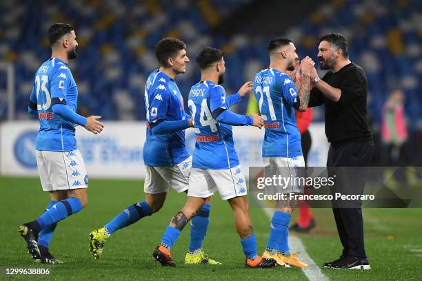 Matteo Politano of SSC Napoli celebrates with Gennaro Gattuso, head coach of Napoli and team mates after scoring their side's second goal during the...