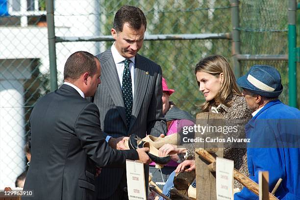 Prince Felipe of Spain and Princess Letizia of Spain visit the village of San Tirso de Abres on October 22, 2011 in Asturias, Spain.