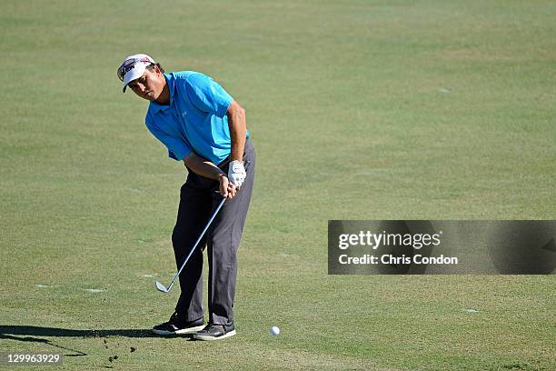 Scott Gardiner of Australia plays a bump and run up to the 12th green during the third round of the Winn-Dixie Jacksonville Open presented by...