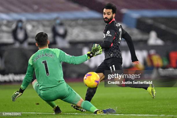 Mohamed Salah of Liverpool scores their side's second goal past Lukasz Fabianski of West Ham United during the Premier League match between West Ham...