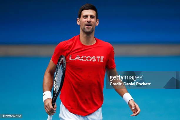 Novak Djokovic of Serbia reacts during a practice session at Melbourne Park on February 1, 2021 in Melbourne, Australia. Melbourne Park is now out of...