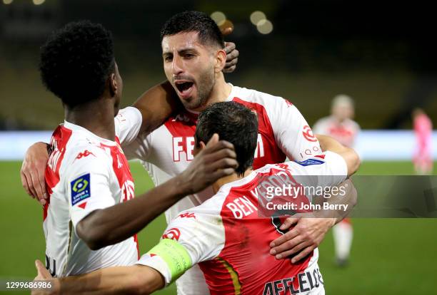 Guillermo Maripan of Monaco celebrates his goal with teammates during the Ligue 1 match between FC Nantes and AS Monaco at Stade de la Beaujoire on...