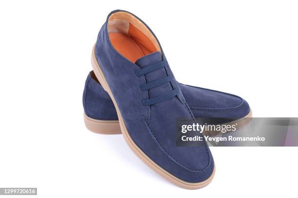 blue suede boots isolated on white background - suede shoe stock-fotos und bilder