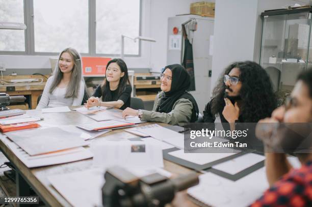 multi ethic group of student listening to their lecturer's explanation at the college classroom jewelry design workshop - community college stock pictures, royalty-free photos & images