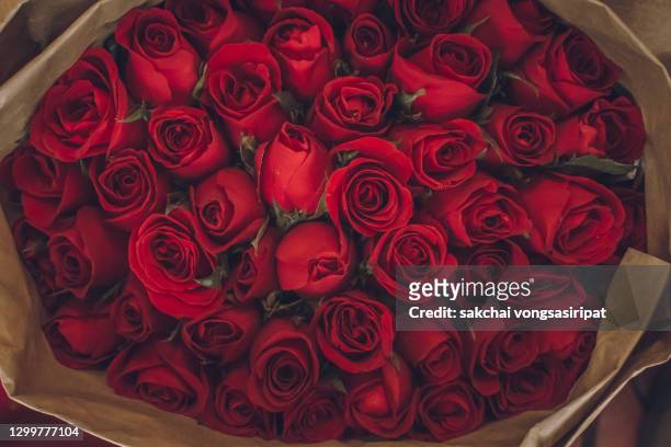 close-up of roses bouquet - rosa stock-fotos und bilder