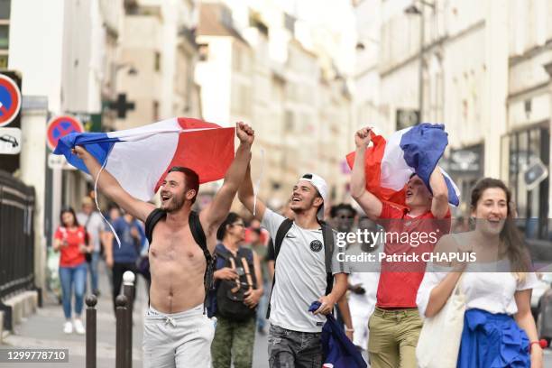 Supporters se rendant sur l'avenue des Champs Elysees, 15 juillet 2018, Paris, France.