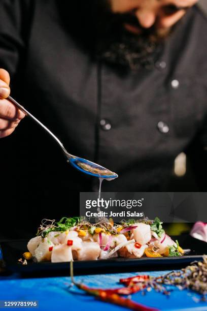 chef preparing a recipe of ceviche - ceviche stock pictures, royalty-free photos & images