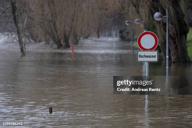 Flooded streets and footpaths seen beside the River Rhine on February 01, 2021 in Bonn, Germany. Up to 40 litres of persistent rain per square meter...