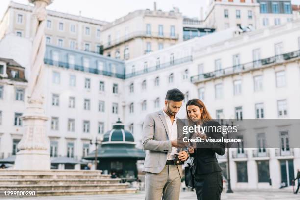 two colleagues on business trip - lisbon stock pictures, royalty-free photos & images