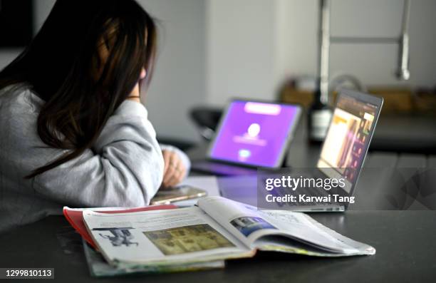 Year 8 Queenswood student Laila Tang starts her Zoom lesson as homeschooling continues due to school closures on February 01, 2021 in Borehamwood,...