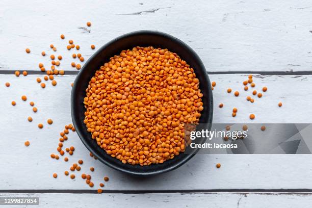 red lentils - lentil ストックフォトと画像