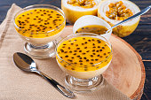 Passion fruit mousse. Refreshing dessert with fresh passion fruit topping
