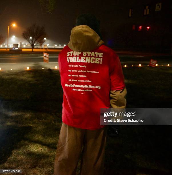 View, from behind, of American religious activist and author Shane Claiborne as he attends an anti-death penalty rally, Terre Haute, Indiana, January...