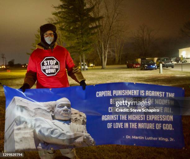 View of American religious activist and author Shane Claiborne during an anti-death penalty rally, Terre Haute, Indiana, January 14, 2021. His...