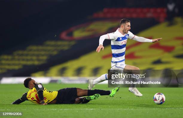 Nathaniel Chalobah of Watford FC challenges Dominic Ball of Queens Park Rangers during the Sky Bet Championship match between Watford and Queens Park...