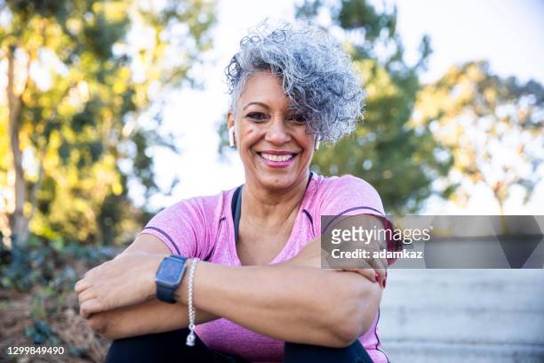 portrait of a black woman - women working out stock pictures, royalty-free photos & images