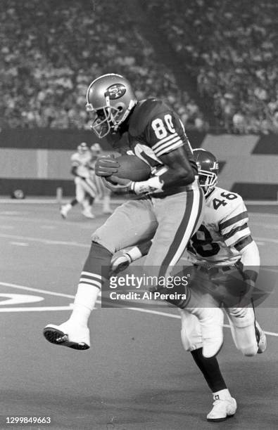 Wide Receiver Jerry Rice of the San Francisco 49ers makes a catch against the New York Jets in a game at The Meadowlands on October 29 in East...
