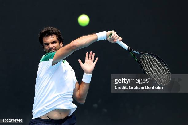 Pablo Andujar of Spain plays a forehand in his match against Pablo Cuevas of Uruguay during day two of the ATP 250 Great Ocean Road Open at Melbourne...