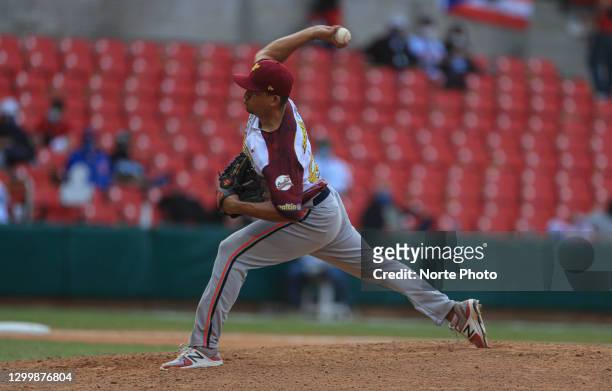 Raul Rivero pitcher starting from Los Caribes Anzoategui of Venezuela throws the ball during the game between Venezuela and Puerto Rico as part of...