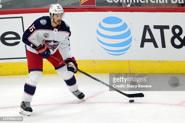 Michael Del Zotto of the Columbus Blue Jackets controls the puck during a game against the Chicago Blackhawks at the United Center on January 29,...