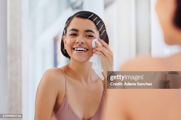 ultra cleansing for that ultra glow - removing make up stock pictures, royalty-free photos & images