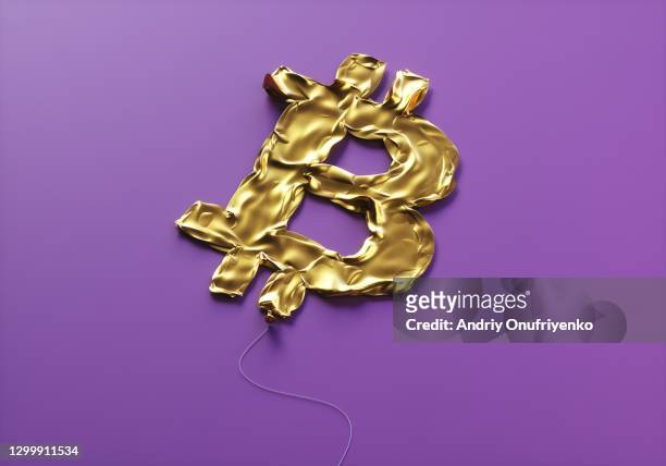 bitcoin sign balloon deflated - bitcoin stock pictures, royalty-free photos & images