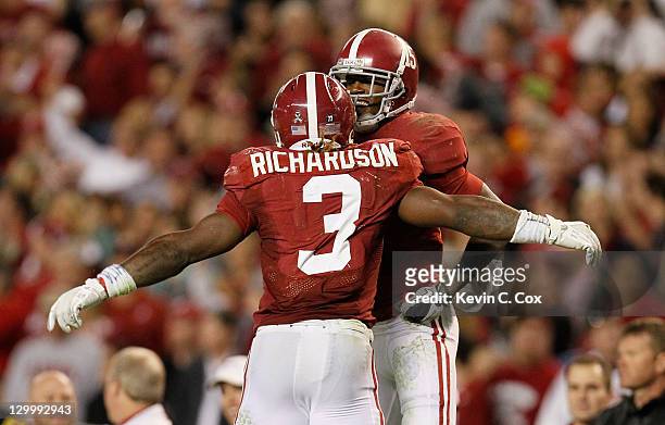 Trent Richardson of the Alabama Crimson Tide celebrates his touchdown against the Tennessee Volunteers with Darius Hanks at Bryant-Denny Stadium on...