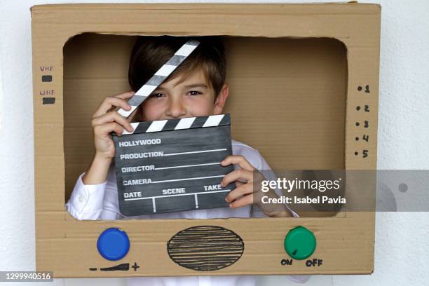 television presenter inside cardboard television - animated film stock-fotos und bilder