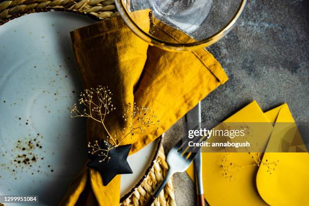 overhead view of a rustic place setting on a  table - napkin ring stock pictures, royalty-free photos & images