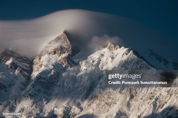 beautiful cloud above nanga parbat mountain massif view from fairy meadow, himalaya mountains range in gilgit baltistan, pakistan - nanga parbat stock pictures, royalty-free photos & images