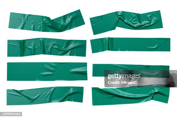 green colored plastic adhesive tape stripes - stickers stock pictures, royalty-free photos & images