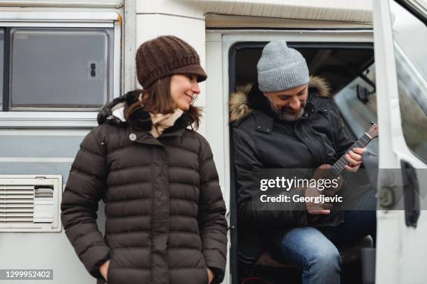 mature couple camping - motor home winter stock pictures, royalty-free photos & images