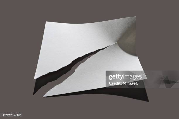 Paper Ripped Inhalf Paper Rip In Half Photos and Premium High Res Pictures - Getty Images