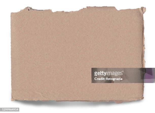 piece of a torn cardboard isolated on white - cardboard stock pictures, royalty-free photos & images