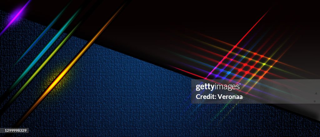 Dark blue and black abstract background with colorful light lines.