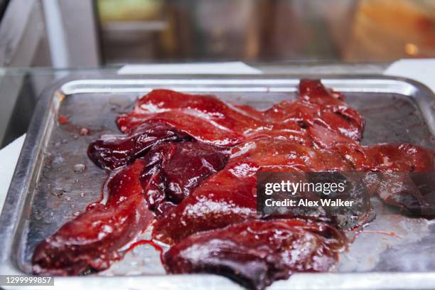 liver meat on metal tray. - beef liver stock pictures, royalty-free photos & images