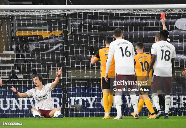 David Luiz of Arsenal reacts to being shown the red card during the Premier League match between Wolverhampton Wanderers and Arsenal at Molineux on...