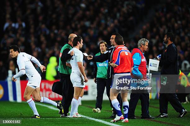 Morgan Parra of France leaves the pitch injured during the 2011 IRB Rugby World Cup Final match between France and New Zealand at Eden Park on...