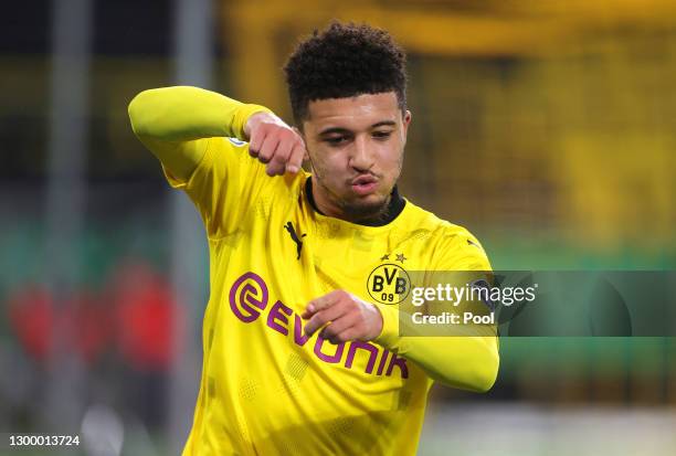 Jadon Sancho of Borussia Dortmund celebrates after scoring their side's second goal during the DFB Cup Round of Sixteen match between Borussia...