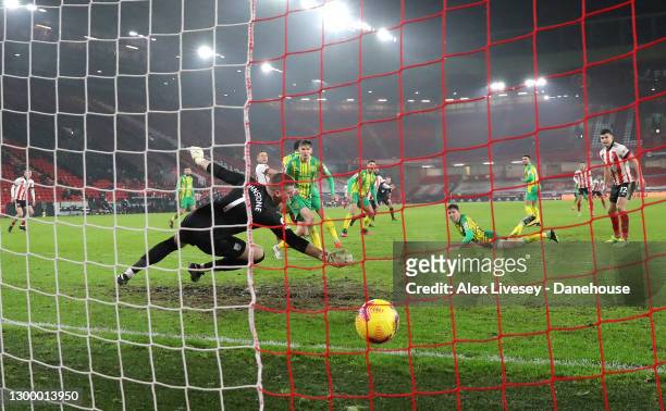 Billy Sharp of Sheffield United beats Sam Johnstone of West Bromwich Albion to score their second goal during the Premier League match between...
