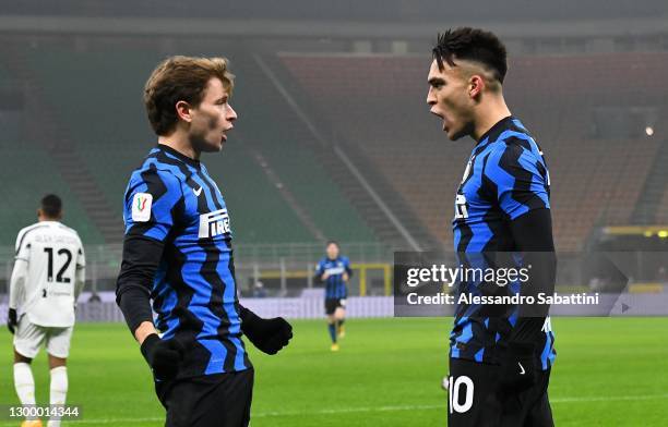 Lautaro Martinez of FC Internazionale celebrates after scoring the opening goal with teammate Nicolò Barella of FC Internazionale during the Coppa...