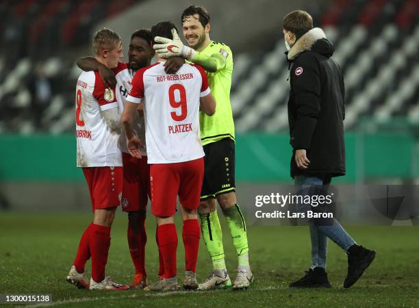 Marcel Platzek and Daniel Davari of Rot-Weiss Essen celebrate following their side's victory after the DFB Cup Round of Sixteen match between...