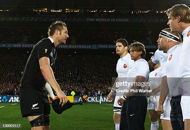 Ali Williams of the All Blacks confronts French players after the haka during the 2011 IRB Rugby World Cup Final match between France and New Zealand...