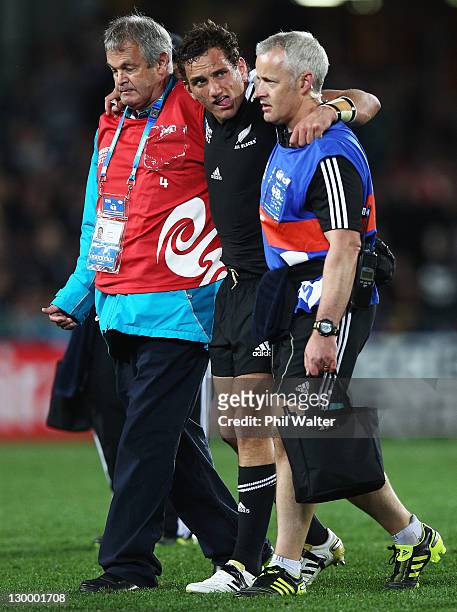 Aaron Cruden of the All Blacks leaves the field injured during the 2011 IRB Rugby World Cup Final match between France and New Zealand at Eden Park...