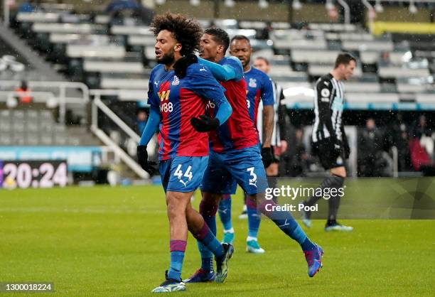 Jairo Riedewald of Crystal Palace celebrates with team mate Patrick van Aanholt after scoring their side's first goal during the Premier League match...