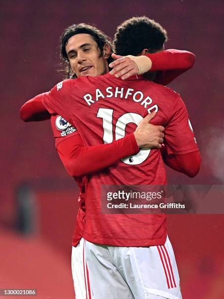 Edinson Cavani of Manchester United celebrates with team mate Marcus Rashford of Manchester United after scoring their side's fourth goal during the...