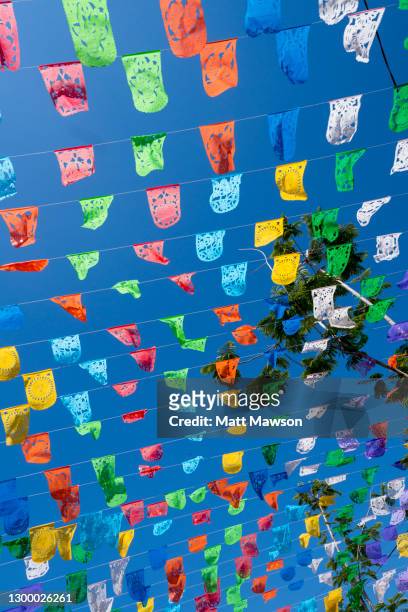 bunting decoration on the streets of mazatlán sinaloa mexico - mexican bunting stock pictures, royalty-free photos & images
