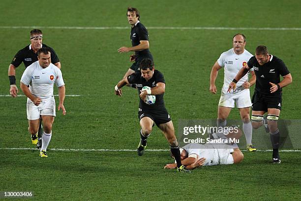 Stephen Donald of the All Blacks charges forward during the 2011 IRB Rugby World Cup Final match between France and New Zealand at Eden Park on...