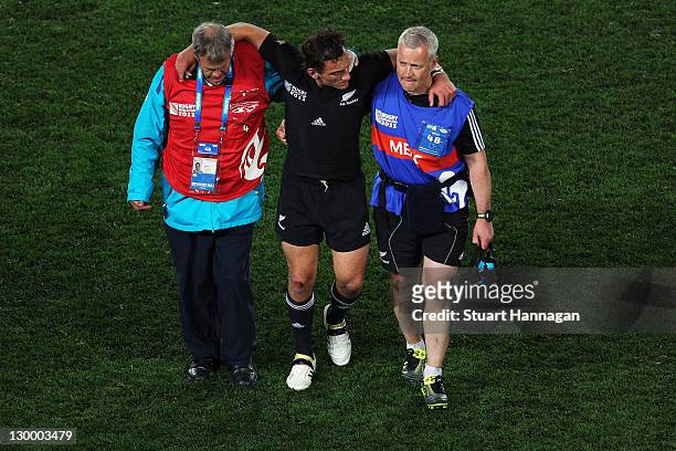 Aaron Cruden of the All Blacks leaves the pitch injured during the 2011 IRB Rugby World Cup Final match between France and New Zealand at Eden Park...